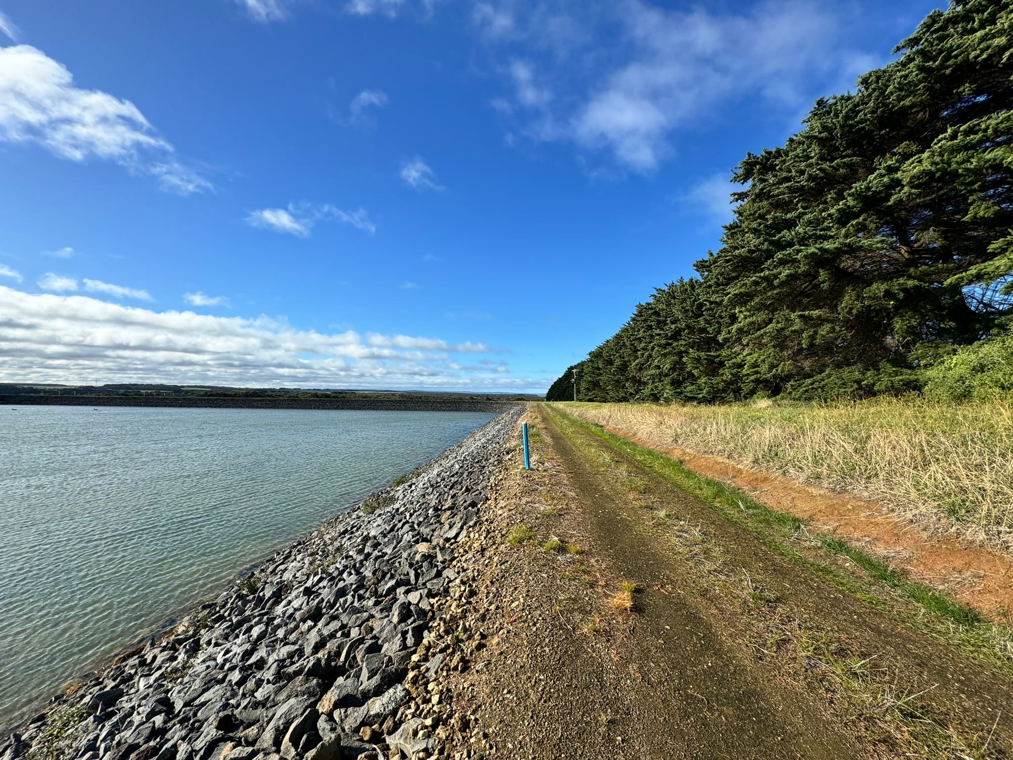 Water reservoir with rock armoring - Cadeema water management project